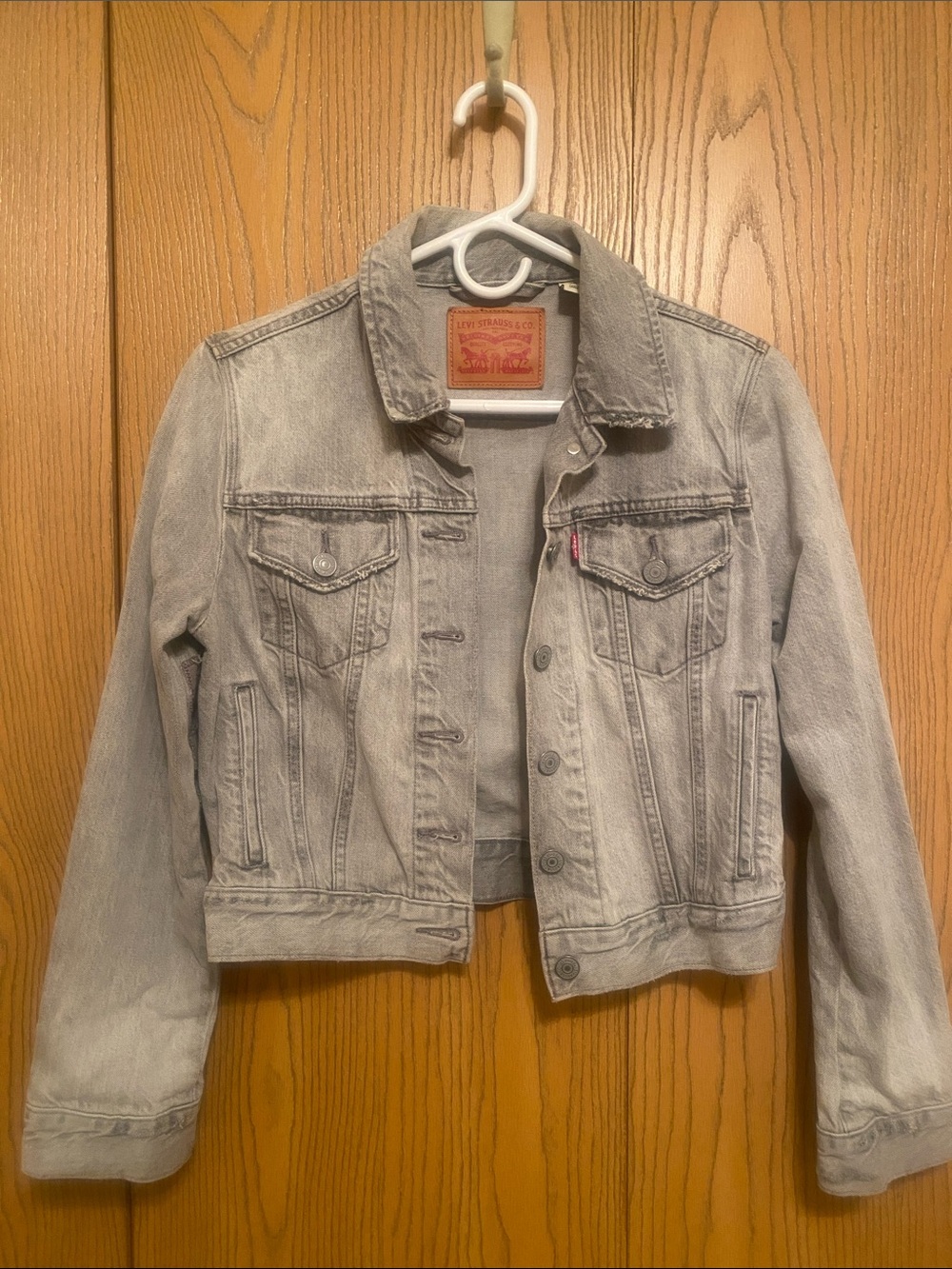 Woman’s Levi’s Cropped Destressed Grey Jean Jacket